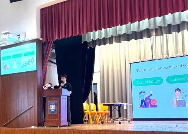 Islam Ambassador presenting moral topics on stage